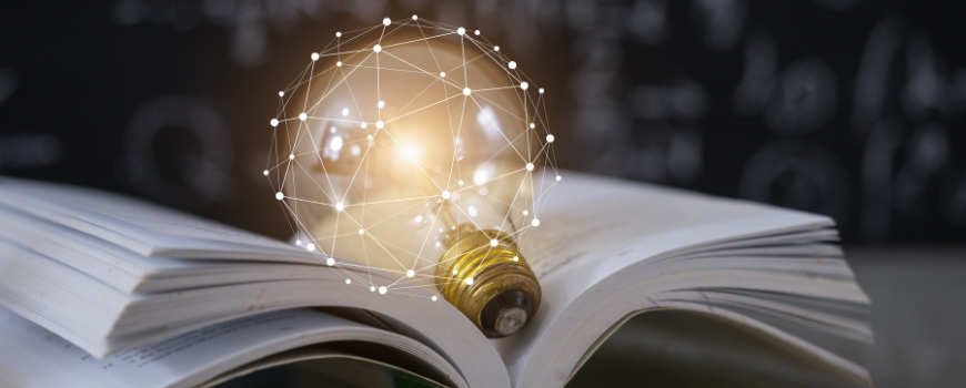 Image of lightbulb on textbook