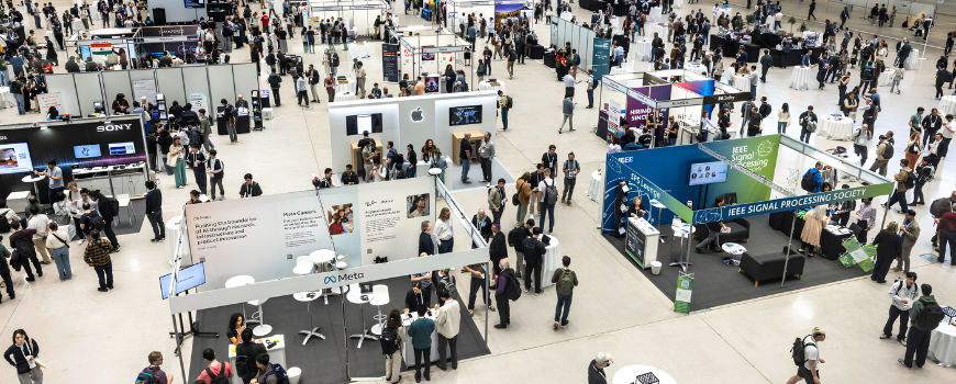 Image of ICASSP 2026 attendees in exhibit hall
