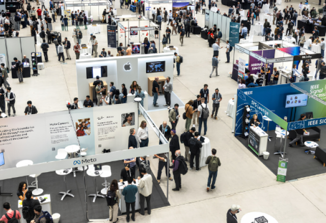 Image of ICASSP 2026 attendees in exhibit hall